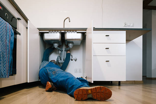 Professional Drain Cleaning technician working in Weatherford, TX